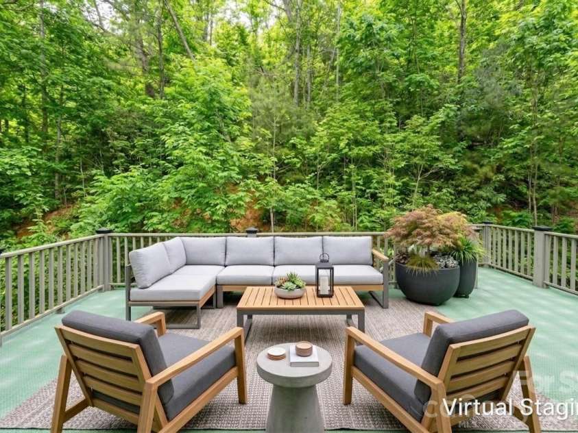 31 Timber Park Drive, Black Mountain, NC 28711.  MLS# CAR4336754, YatesRealty ID 3605. Virtually staged deck over car port