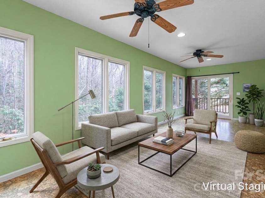 31 Timber Park Drive, Black Mountain, NC 28711.  MLS# CAR4336754, YatesRealty ID 3605. Virtually staged sunroom