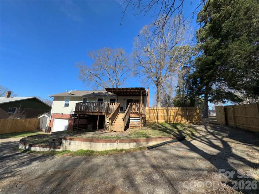413 Roberts Street, Salisbury, NC 28144.  MLS# CAR4341075, YatesRealty ID 3605. Concrete driveway circles from road to back of house 