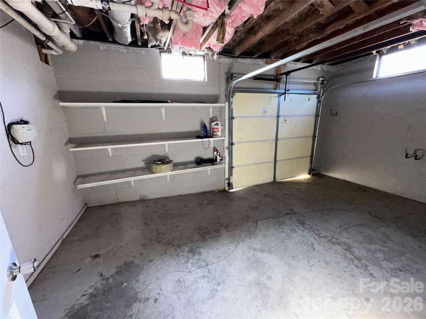 413 Roberts Street, Salisbury, NC 28144.  MLS# CAR4341075, YatesRealty ID 3605. Entrance from Rec Room to Garage 