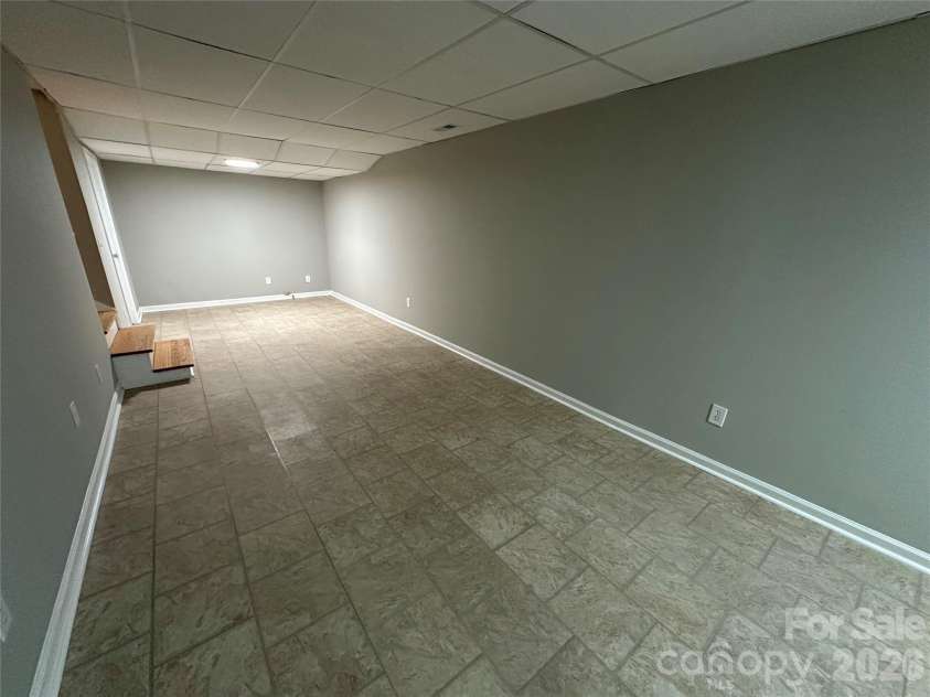 413 Roberts Street, Salisbury, NC 28144.  MLS# CAR4341075, YatesRealty ID 3605. Welcome downstairs to your Rec Room 