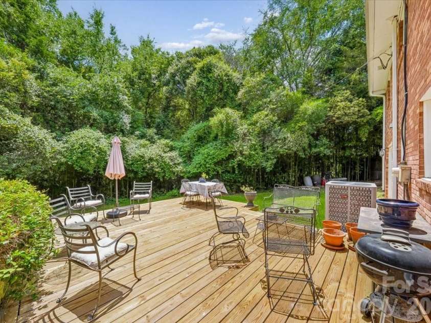 1135 Blueberry Lane, Charlotte, NC 28226.  MLS# CAR4397066, YatesRealty ID 36050. Massive deck addition!