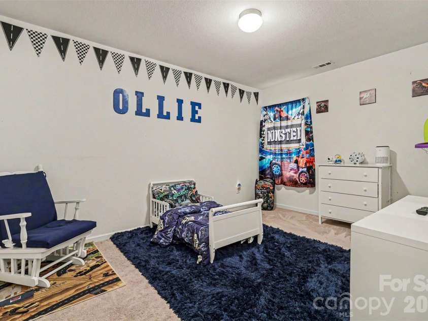 9424 Quilting Bee Lane, Charlotte, NC 28216.  MLS# CAR4393973, YatesRealty ID 36051. Forth bedroom. Accomadates any age!