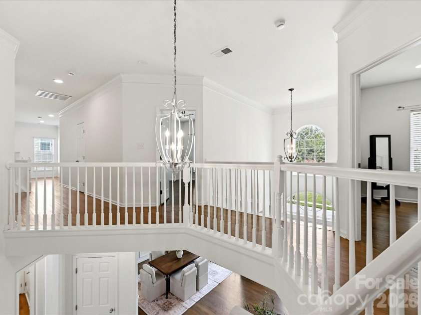 6609 Augustine Way, Charlotte, NC 28270.  MLS# CAR4398233, YatesRealty ID 36052. Front House Stairwell