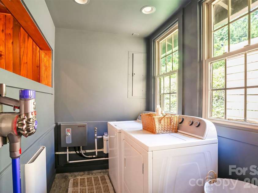 150 Indian Cave Park Road, Hendersonville, NC 28739.  MLS# CAR4400404, YatesRealty ID 36059. Laundry room off kitchen