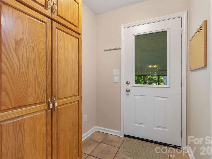3005 Weddington Road, Monroe, NC 28110.  MLS# CAR4402031, YatesRealty ID 36067. Rear entrance off screened in porch and carport