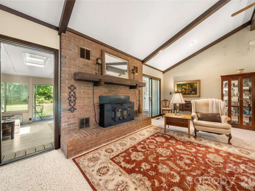 3426 Driftwood Drive, Gastonia, NC 28056.  MLS# CAR4378583, YatesRealty ID 36071. Double sided fire place