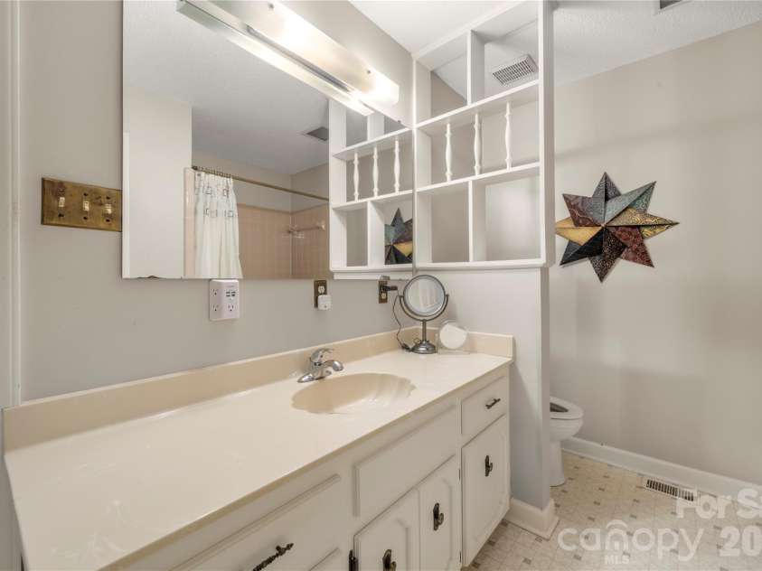 3426 Driftwood Drive, Gastonia, NC 28056.  MLS# CAR4378583, YatesRealty ID 36071. Primary bathroom with added storage