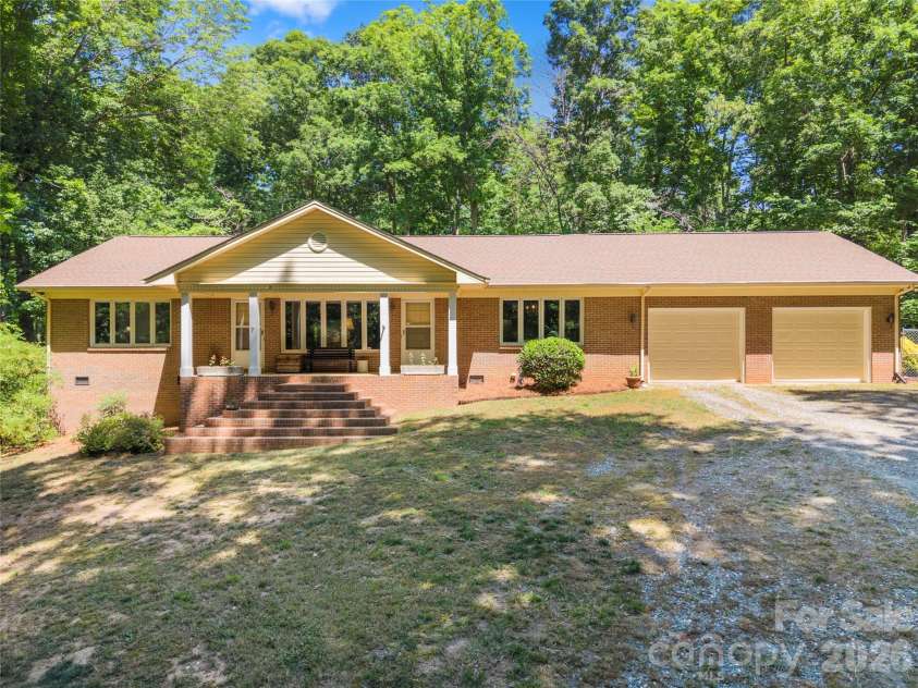 3426 Driftwood Drive, Gastonia, NC 28056.  MLS# CAR4378583, YatesRealty ID 36071. Two car garage with additional attic storage above