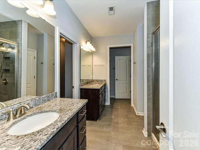 15738 Reynolds Drive, Indian Land, SC 29707.  MLS# CAR4377372, YatesRealty ID 36072. Primary Bathroom