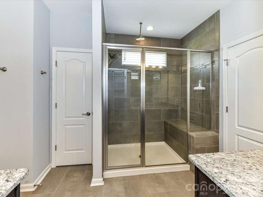 15738 Reynolds Drive, Indian Land, SC 29707.  MLS# CAR4377372, YatesRealty ID 36072. Primary Bathroom