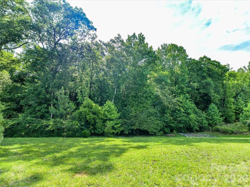 15738 Reynolds Drive, Indian Land, SC 29707.  MLS# CAR4377372, YatesRealty ID 36072. Private Back Yard