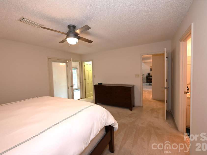 3675 Rock Bridge Drive, Conover, NC 28613.  MLS# CAR4392922, YatesRealty ID 36073. Primary Bedroom with access to primary bath and sunroom