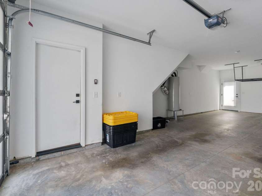 1218 Minter Place, Charlotte, NC 28203.  MLS# CAR4394962, YatesRealty ID 36074. Spacious 2 Car Garage