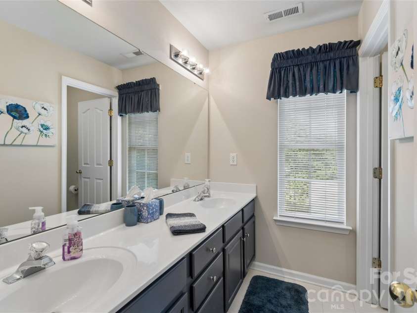 4831 Turnridge Court, Concord, NC 28027.  MLS# CAR4396977, YatesRealty ID 36078. 2nd full bath with dual vanity for busy homes!