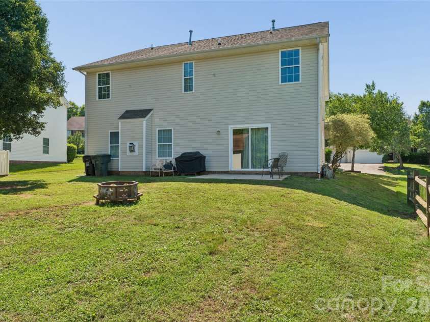 4831 Turnridge Court, Concord, NC 28027.  MLS# CAR4396977, YatesRealty ID 36078. Ample yard space for gatherings!