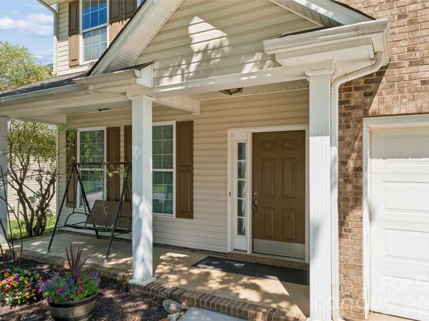 4831 Turnridge Court, Concord, NC 28027.  MLS# CAR4396977, YatesRealty ID 36078. Inviting Front Porch