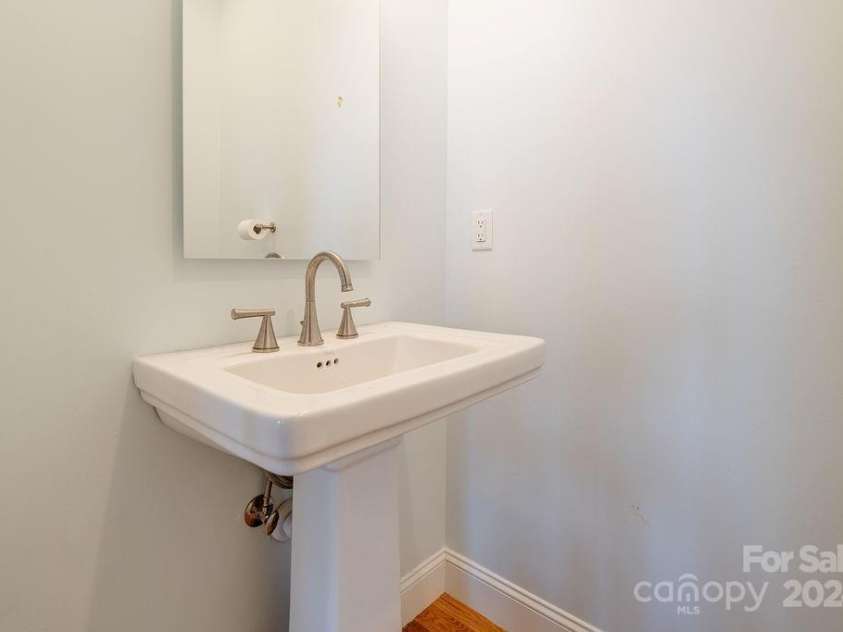 406 Kessler Place, Asheville, NC 28804.  MLS# CAR4172297, YatesRealty ID 3608. Second level half bath.