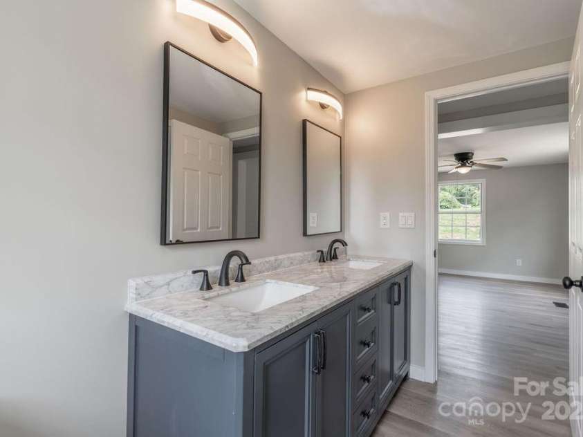 55 Shannon Park Circle, Taylorsville, NC 28681.  MLS# CAR4167019, YatesRealty ID 3609. Primary en-suite Bath w/ storage