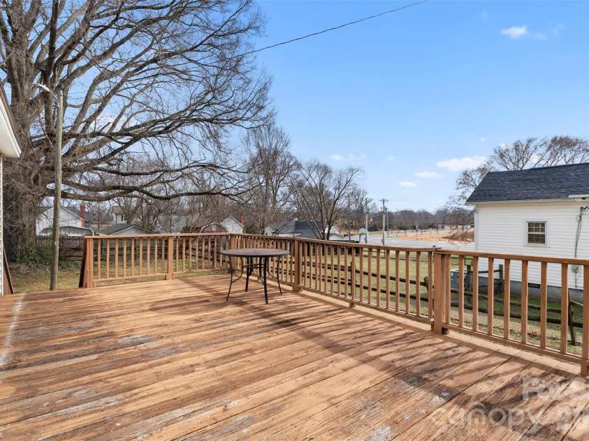606 Juniper Street, Kannapolis, NC 28081.  MLS# CAR4347079, YatesRealty ID 3609. Back deck with views of downtown Kannapolis