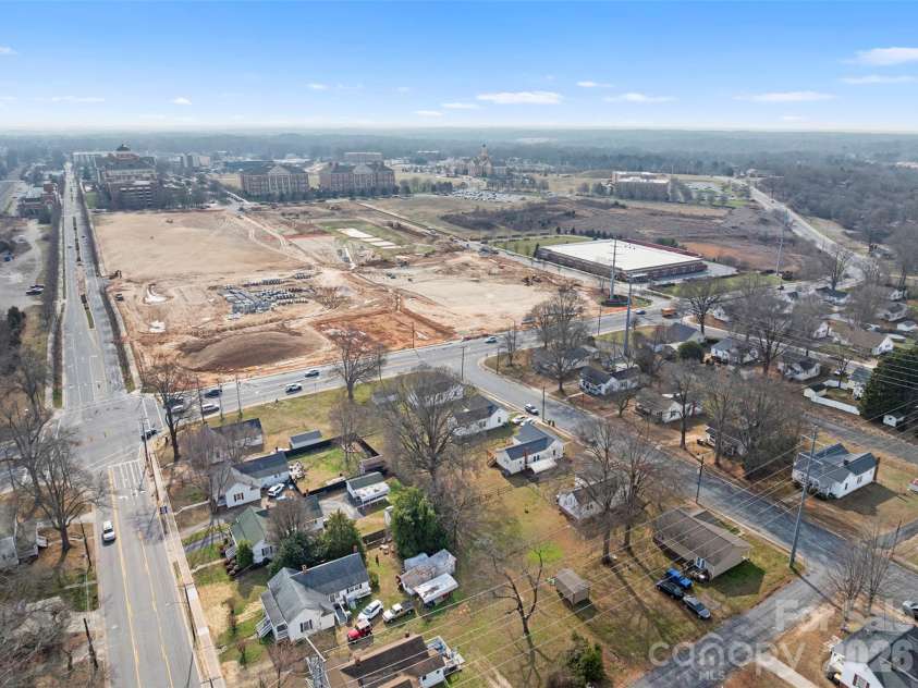 606 Juniper Street, Kannapolis, NC 28081.  MLS# CAR4347079, YatesRealty ID 3609. Project under construction is a grocery store, pharmacy, gas, coffee, etc. 