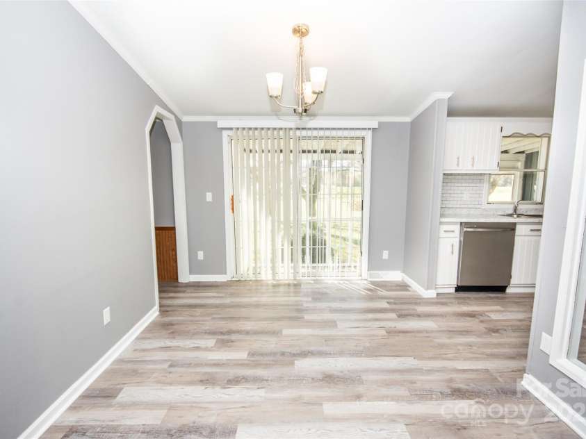 943 Tabor Road, Olin, NC 28660.  MLS# CAR4319811, YatesRealty ID 3609. Dining area that is open to the kitchen and living space!