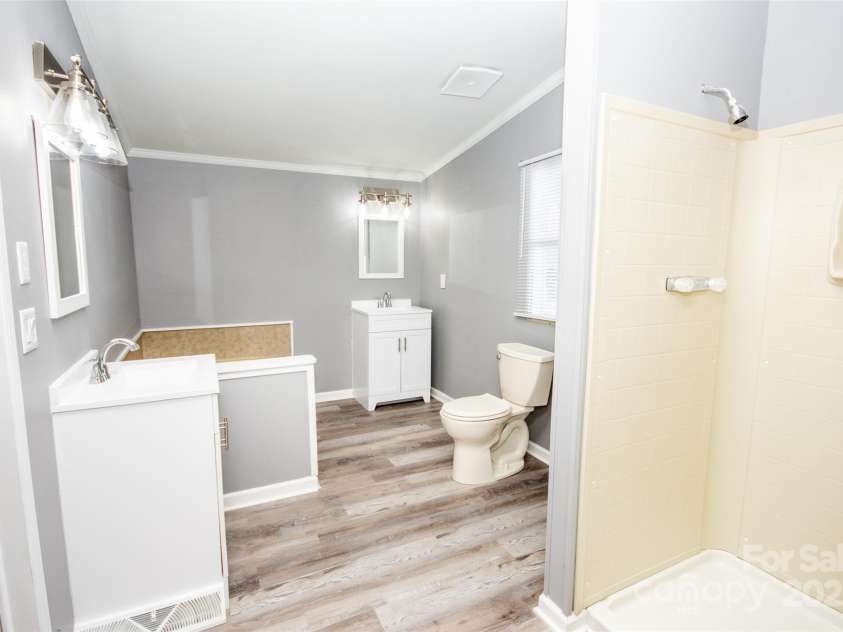 943 Tabor Road, Olin, NC 28660.  MLS# CAR4319811, YatesRealty ID 3609. Large Master Bath with shower, separate tub, and walk in closet