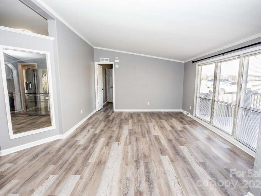 943 Tabor Road, Olin, NC 28660.  MLS# CAR4319811, YatesRealty ID 3609. Spacious Living Room