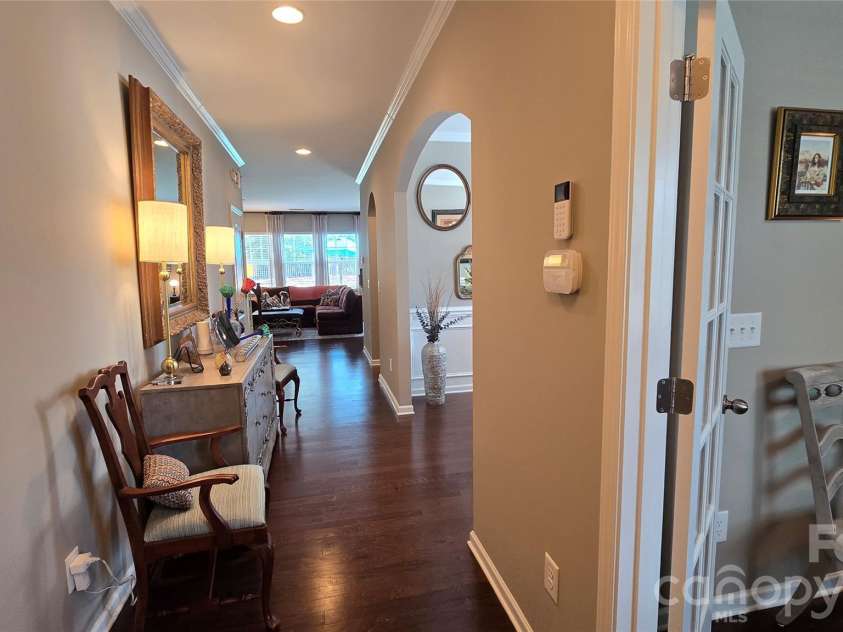 1005 Wainscott Drive, Waxhaw, NC 28173.  MLS# CAR4400196, YatesRealty ID 36092. Entry Hall looking towards Living Room straight ahead, Office to the immediate right, Dining Room with arched entryway - midway on the right side.