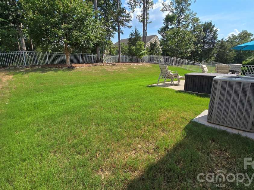 1005 Wainscott Drive, Waxhaw, NC 28173.  MLS# CAR4400196, YatesRealty ID 36092. Fully fenced backyard!