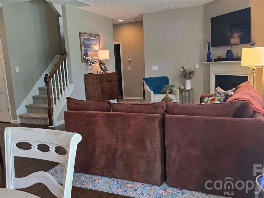 1005 Wainscott Drive, Waxhaw, NC 28173.  MLS# CAR4400196, YatesRealty ID 36092. Living Room area with cozy gas fireplace