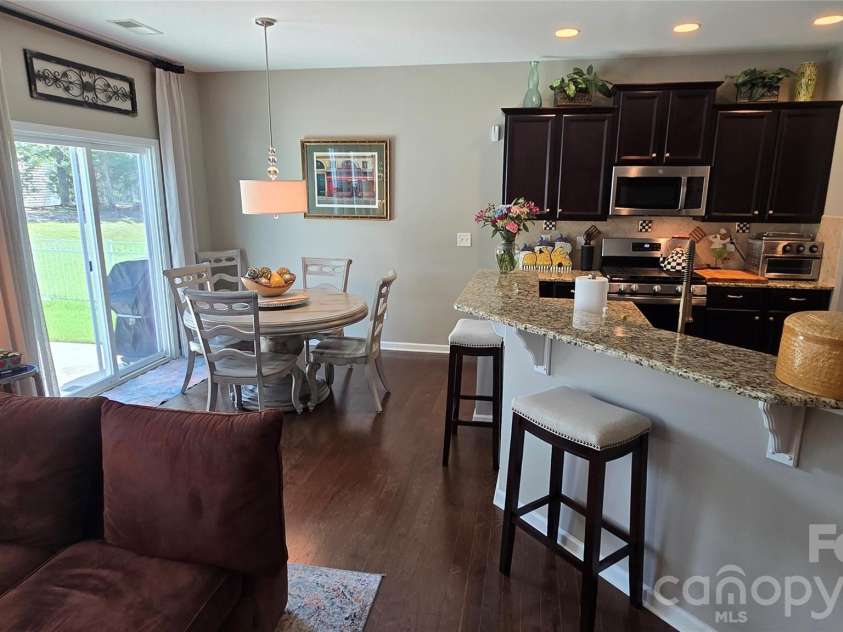 1005 Wainscott Drive, Waxhaw, NC 28173.  MLS# CAR4400196, YatesRealty ID 36092. Open area to kitchen and breakfast area .