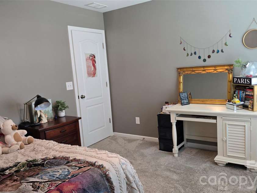 1005 Wainscott Drive, Waxhaw, NC 28173.  MLS# CAR4400196, YatesRealty ID 36092. Upstairs bedroom front middle of house.