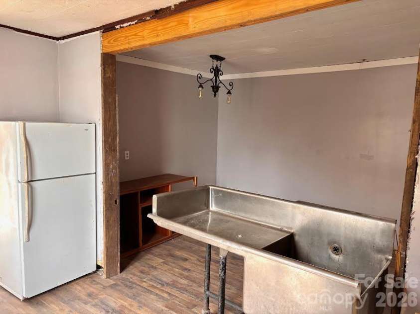 117 Lookout Road, Asheville, NC 28804.  MLS# CAR4349927, YatesRealty ID 36095. Kitchen looking into the dining area.