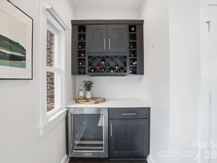 1024 Wesley Park Lane, Charlotte, NC 28208.  MLS# CAR4392665, YatesRealty ID 36096. Built in bar and wine fridge