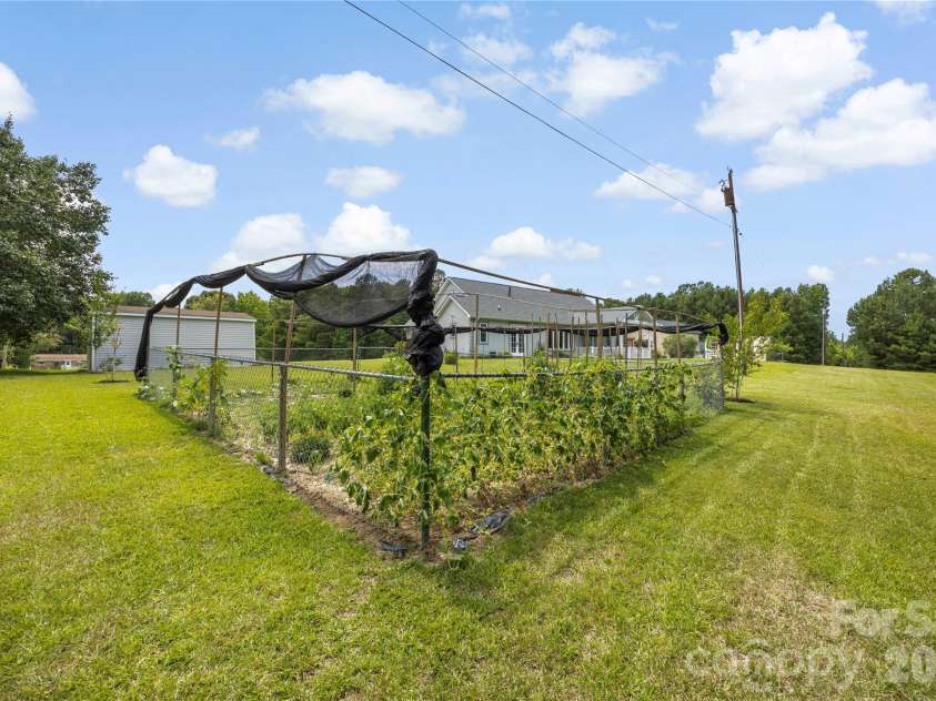 400 Charles Pettus Road, Lancaster, SC 29720.  MLS# CAR4398066, YatesRealty ID 36098. Vegetable garden