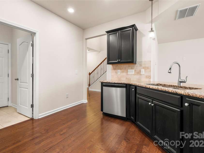 113 Burlingame Court, Mooresville, NC 28117.  MLS# CAR4228046, YatesRealty ID 3610. Laundry Room is right off of Kitchen
