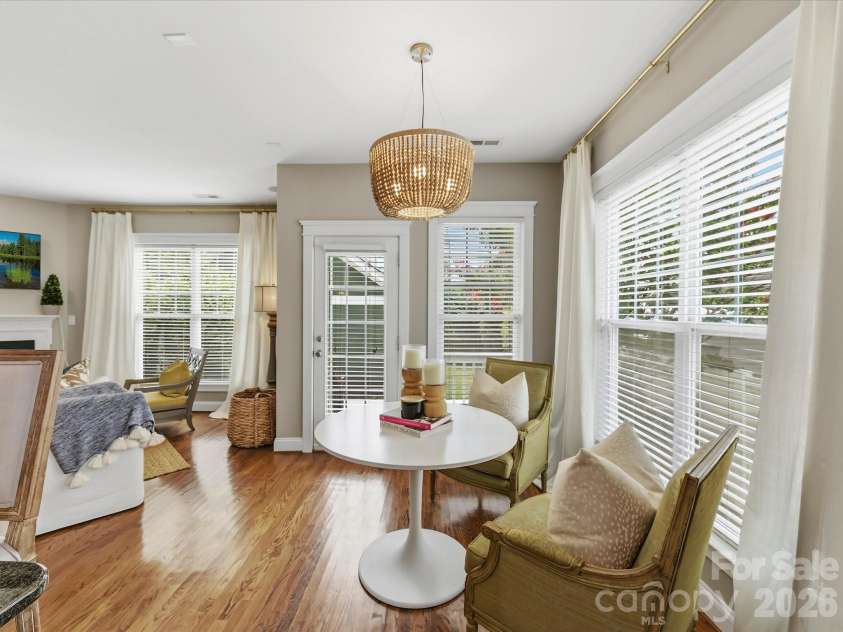 15715 Taviston Street, Huntersville, NC 28078.  MLS# CAR4401975, YatesRealty ID 36105. Enjoy casual dining in the bright breakfast nook, where large windows fill the space with natural light and create a warm, inviting atmosphere.