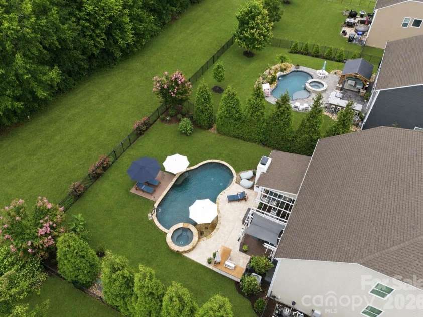 14336 Baytown Court, Huntersville, NC 28078.  MLS# CAR4399744, YatesRealty ID 36107. Bird's-eye view showcases the incredible outdoor living spaces and oversized backyard.
