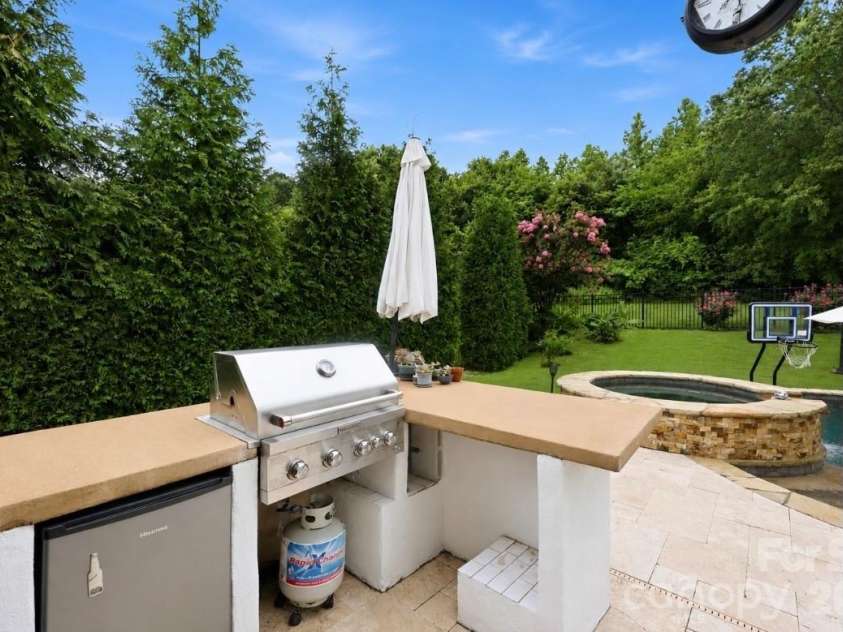 14336 Baytown Court, Huntersville, NC 28078.  MLS# CAR4399744, YatesRealty ID 36107. Built-in grilling station makes backyard cookouts and gatherings a breeze.