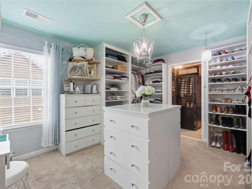 14336 Baytown Court, Huntersville, NC 28078.  MLS# CAR4399744, YatesRealty ID 36107. Converted 6th bedroom into a boutique-style closet offers exceptional storage and organization.