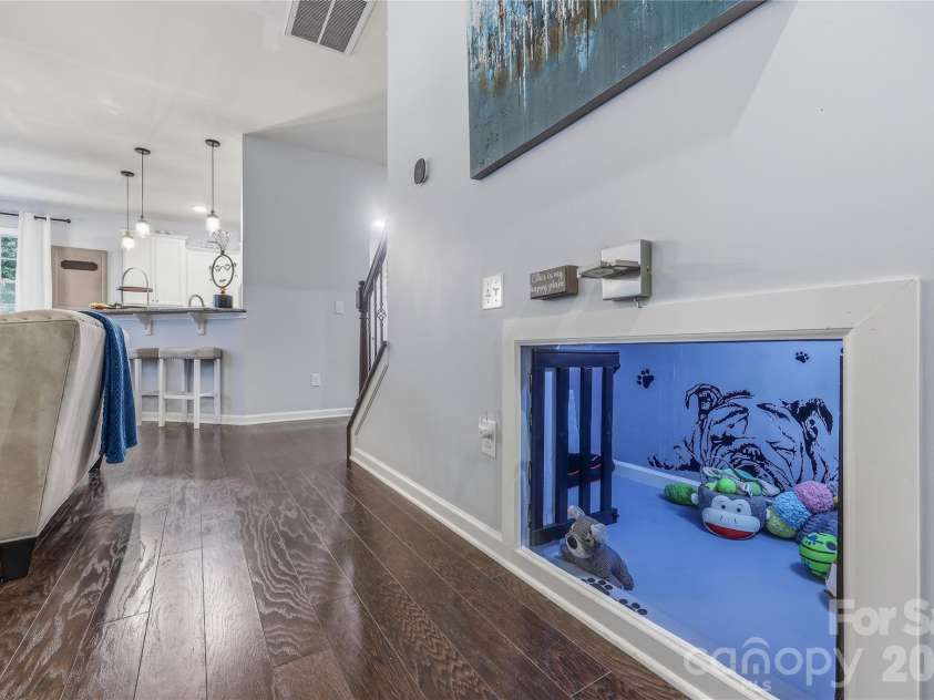 14336 Baytown Court, Huntersville, NC 28078.  MLS# CAR4399744, YatesRealty ID 36107. Custom built private pet retreat located under main staircase.