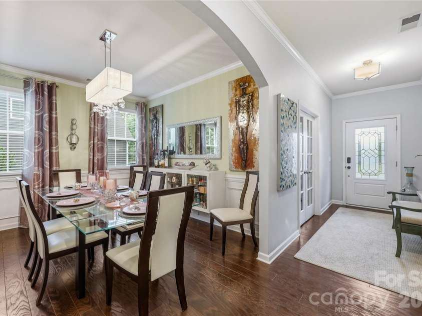 14336 Baytown Court, Huntersville, NC 28078.  MLS# CAR4399744, YatesRealty ID 36107. Dining room offers beautiful architectural details and custom built-ins.