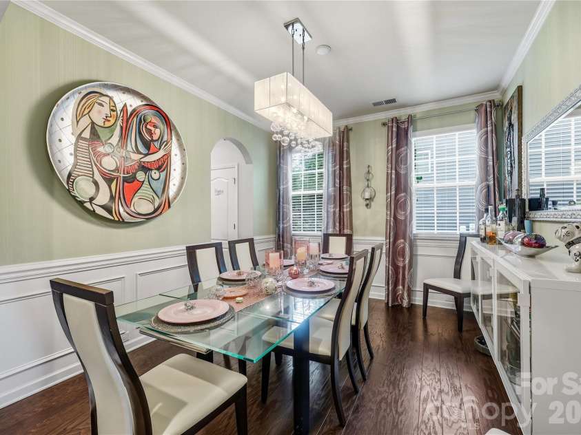 14336 Baytown Court, Huntersville, NC 28078.  MLS# CAR4399744, YatesRealty ID 36107. Elegant dining room equipped with dimmable ambient lighting is ready for special occasions.