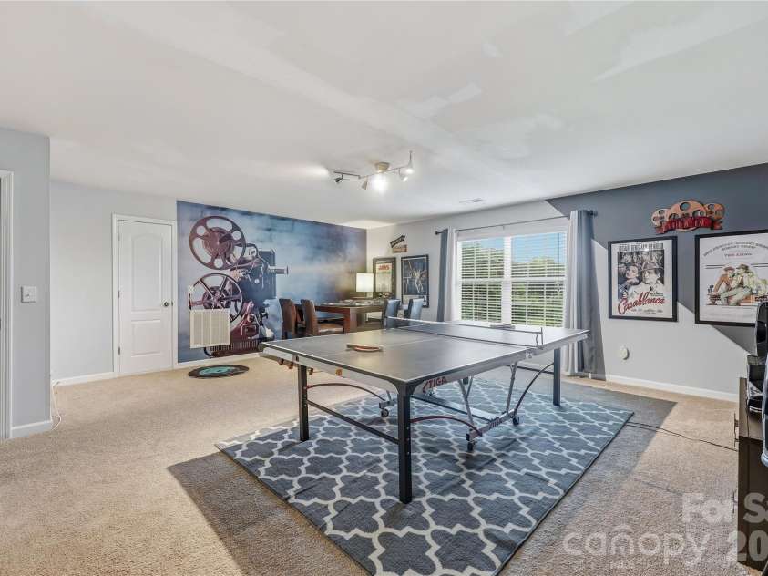 14336 Baytown Court, Huntersville, NC 28078.  MLS# CAR4399744, YatesRealty ID 36107. Expansive recreation room offers endless possibilities for games, media, or entertaining.