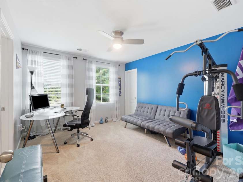 14336 Baytown Court, Huntersville, NC 28078.  MLS# CAR4399744, YatesRealty ID 36107. Flexible upstairs bedroom easily serves as an office, study, or guest suite.