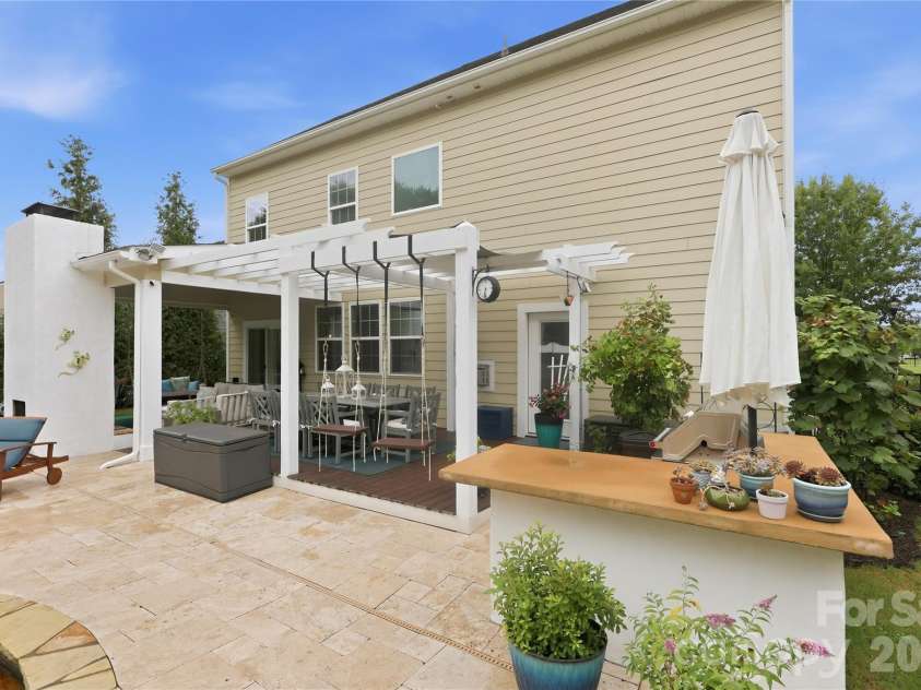 14336 Baytown Court, Huntersville, NC 28078.  MLS# CAR4399744, YatesRealty ID 36107. Spacious patio seamlessly connects the home to the outdoor entertaining areas.