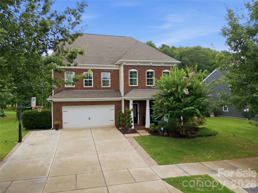 14336 Baytown Court, Huntersville, NC 28078.  MLS# CAR4399744, YatesRealty ID 36107. Welcome home to this beautifully maintained Birkdale residence with timeless curb appeal and mature landscaping.