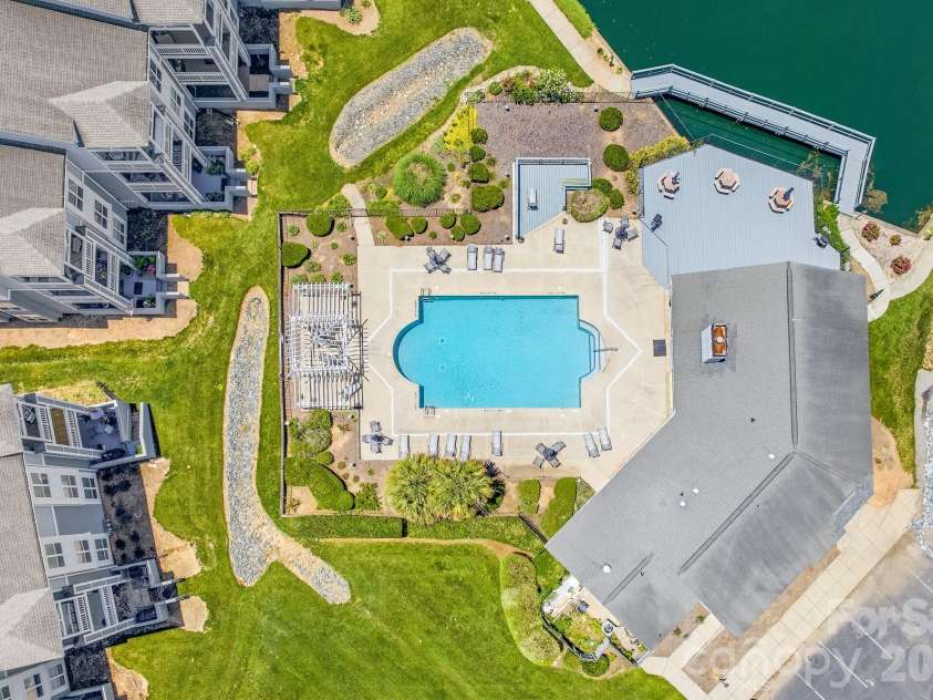 18816 Nautical Drive, Cornelius, NC 28031.  MLS# CAR4392841, YatesRealty ID 36108. Clubhouse and community pool.