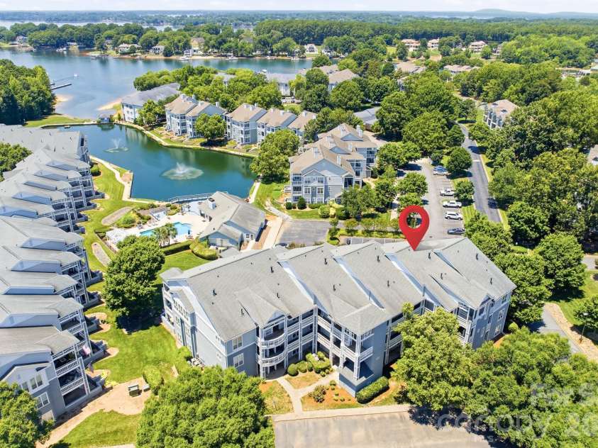 18816 Nautical Drive, Cornelius, NC 28031.  MLS# CAR4392841, YatesRealty ID 36108. Penthouse level condo with elevator and water views